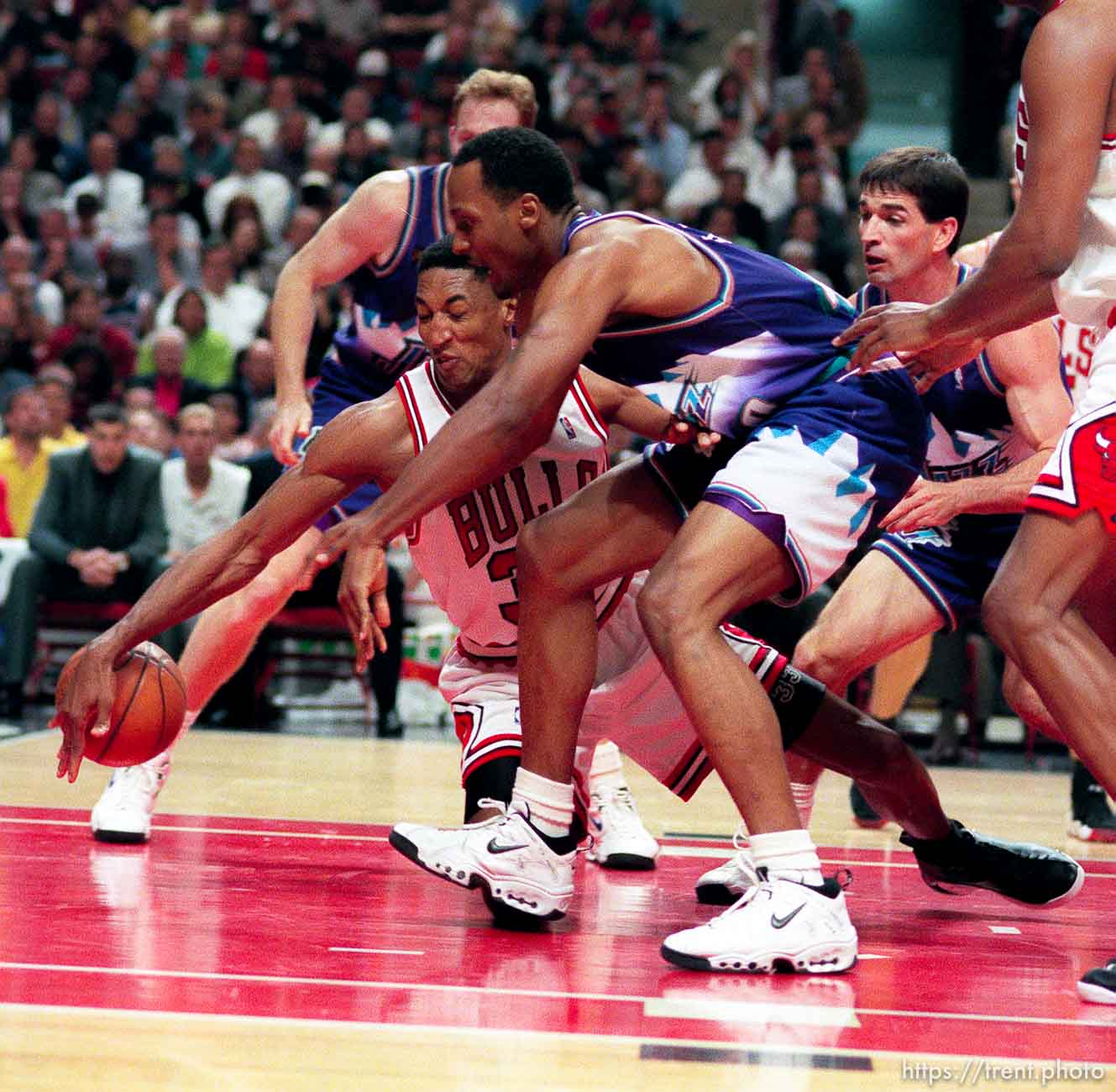 Scottie Pippen and Shanden Anderson scramble for the ball at Jazz vs. Bulls, game 4 of the NBA Finals. Bulls won