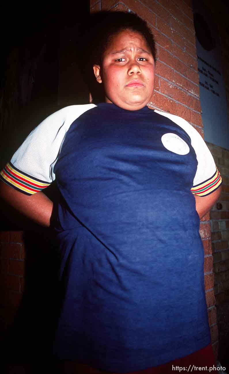 Kid in front of Trolley Games, march 1988.