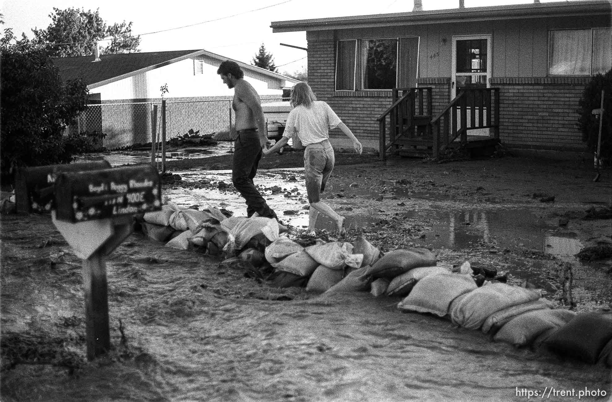 The Murdock Canal broke through its banks above a Lindon neighborhood sending a torrent that ripped out yards and roads and filled some finished basements.