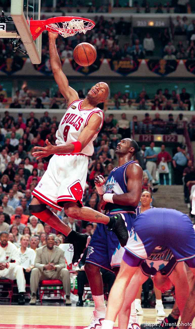 Ron Harper dunks over Karl Malone and someone's butt at Jazz vs. Bulls, game 3 of the NBA Finals. Bulls won