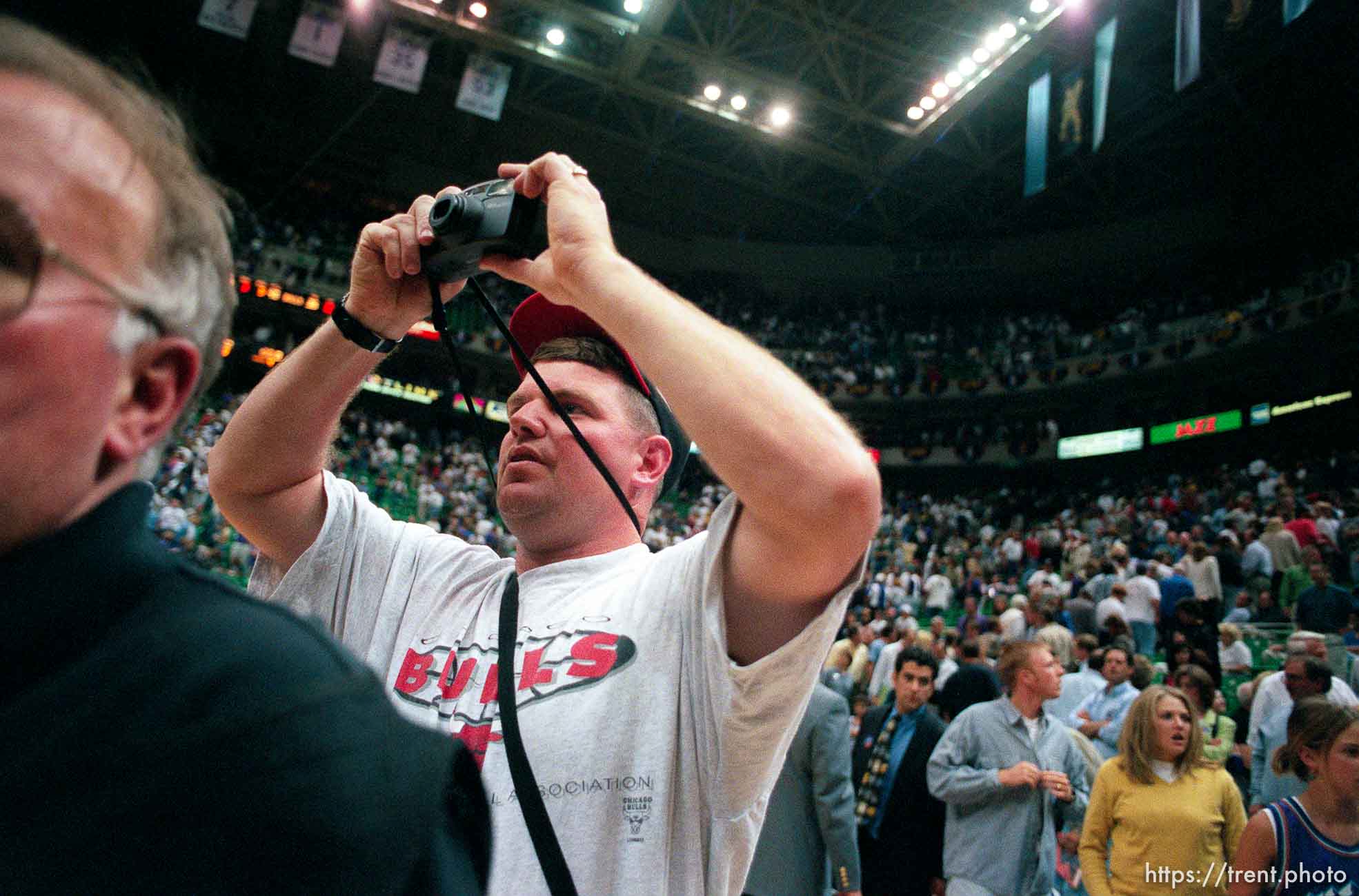 Fan on court with point-and-shoot camera at Jazz vs. Bulls, game 3 of the NBA Finals. Bulls won