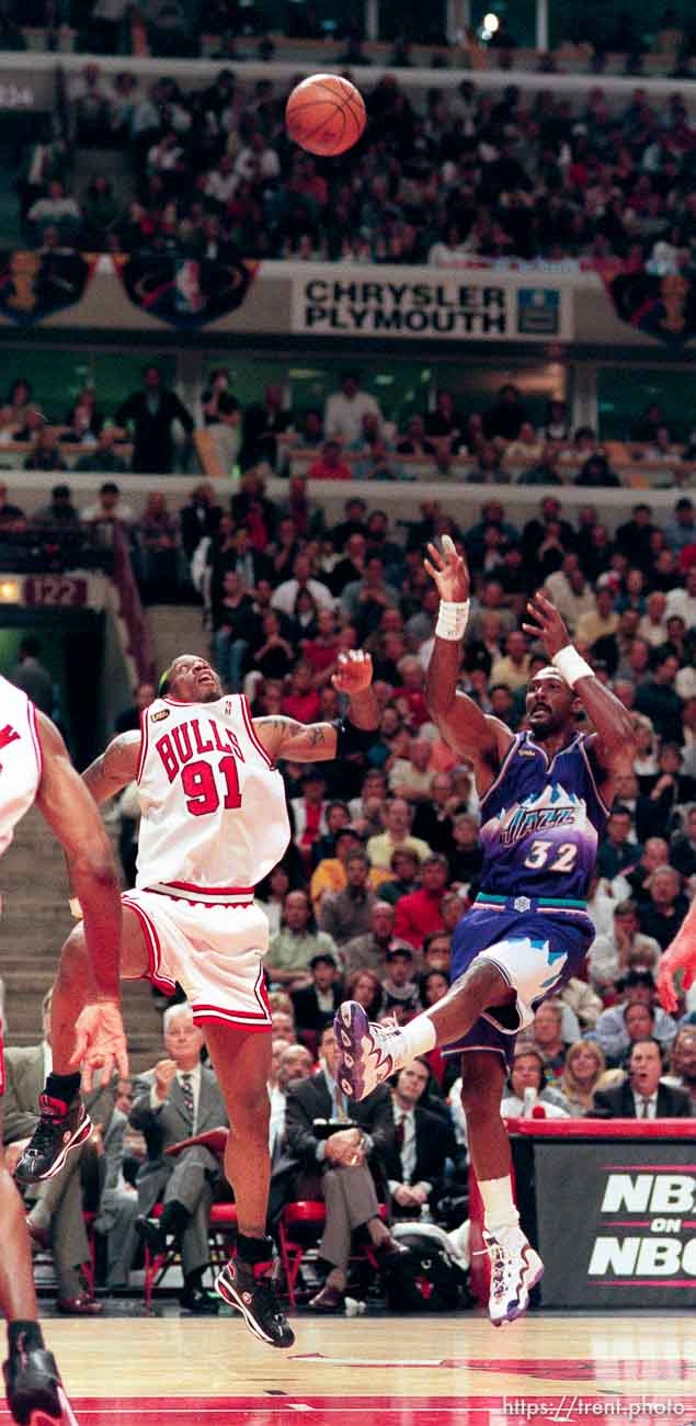 Karl Malone shoots over Dennis Rodman at Jazz vs. Bulls, game 3 of the NBA Finals. Bulls won