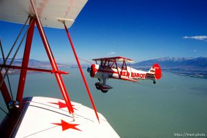 Red Baron pizza stunt biplanes over Utah Lake, june 1988. open-cockpit Stearmans, the Red Baron Squadron.