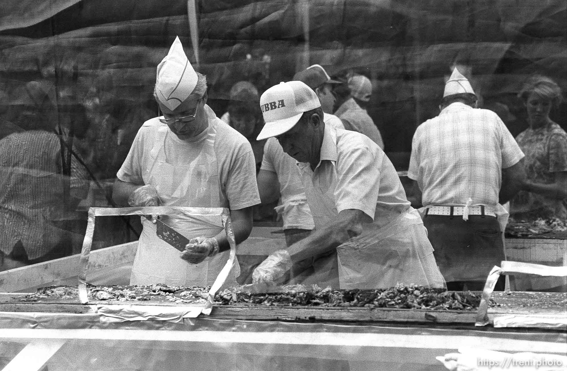 Cooking at 34th annual Salmon Supper at Memorial Park.