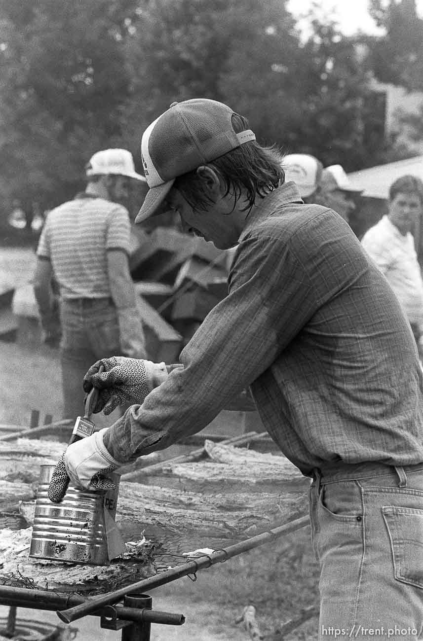 Sweat-soaked cook at 34th annual Salmon Supper at Memorial Park.