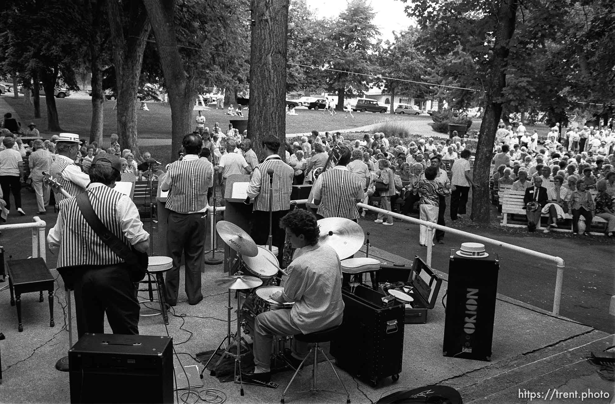 People listening to band at 34th annual Salmon Supper at Memorial Park.