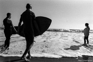 Joey, John, Peter skimboarding.