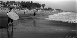 Peter skimboarding.