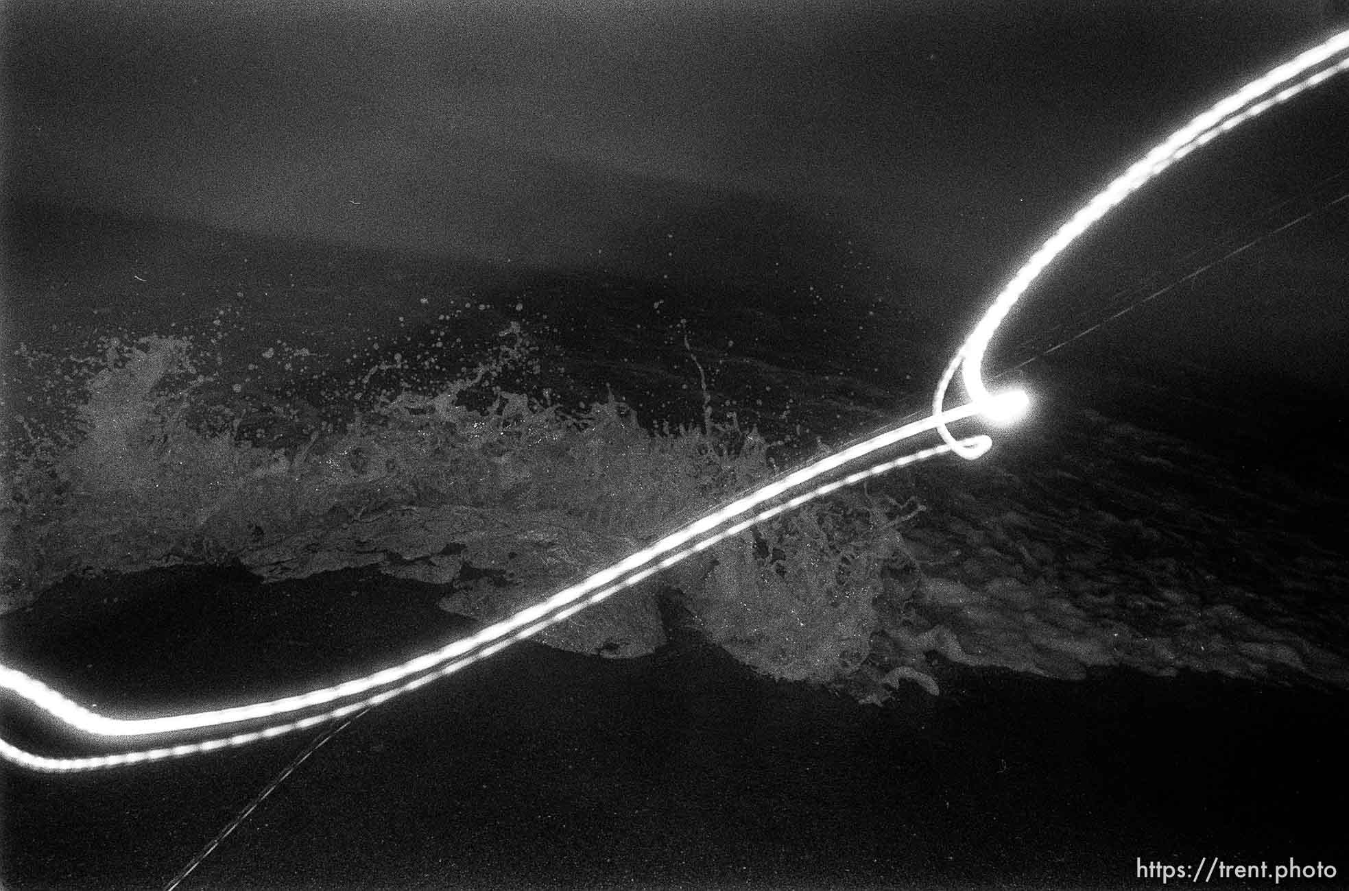 Beach and waves and light swirl.