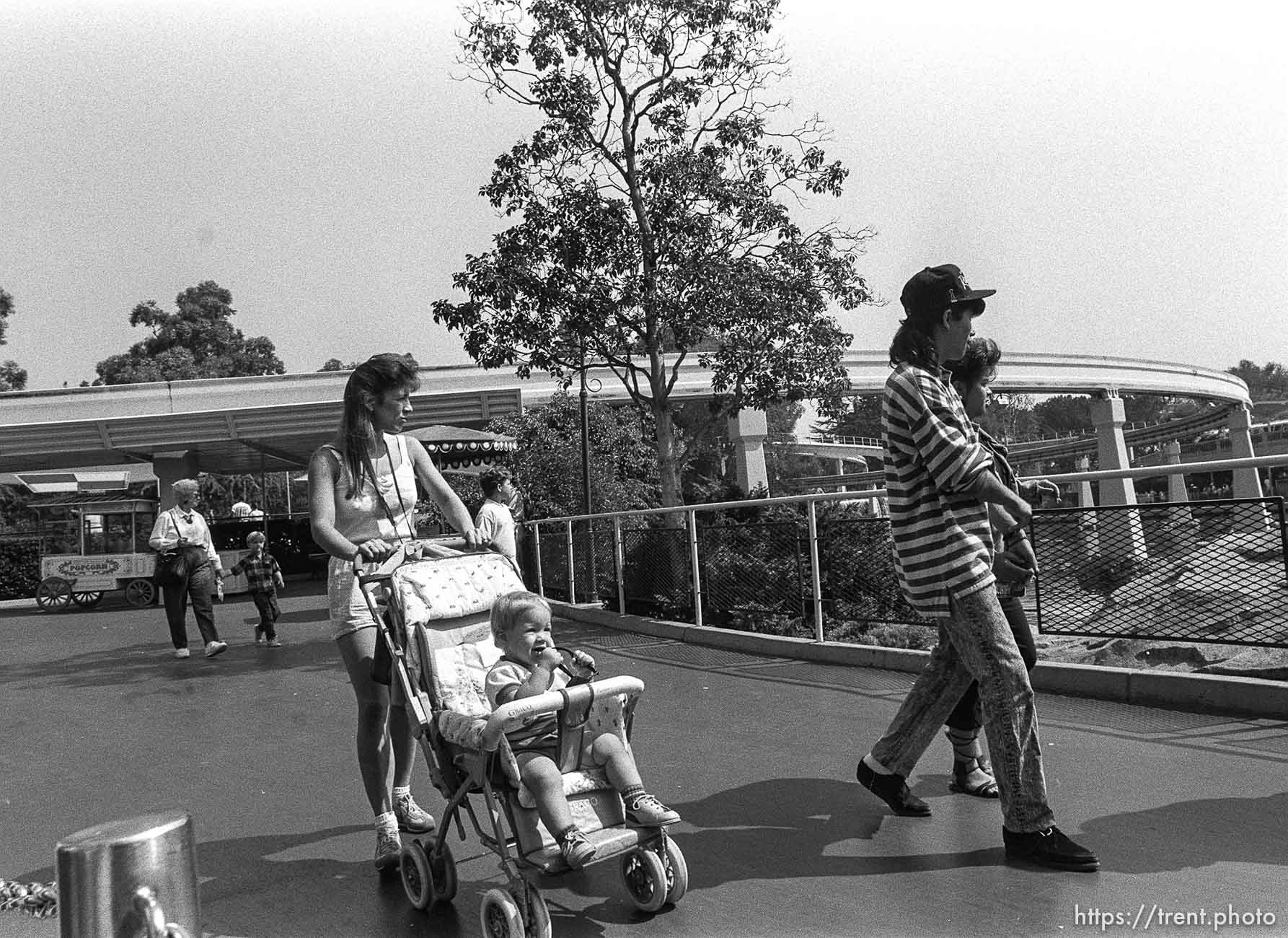 People walking by at Disneyland.