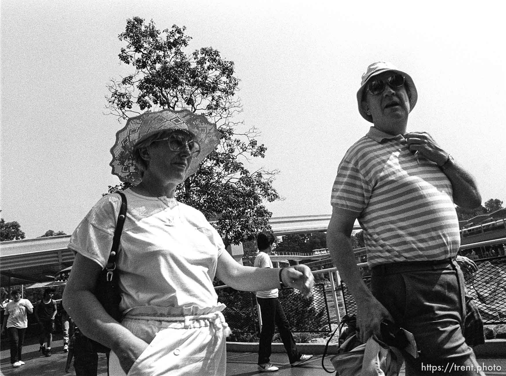 People walking by at Disneyland.