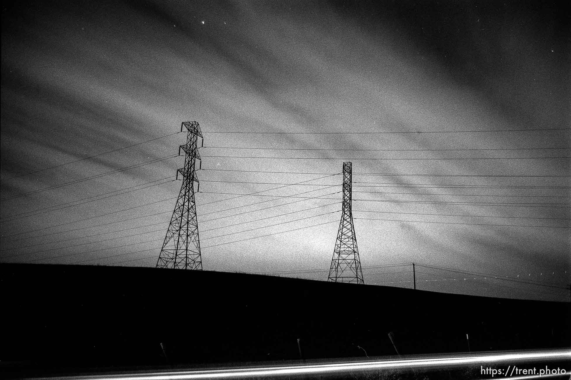 Powerlines along Dougherty Road at night.