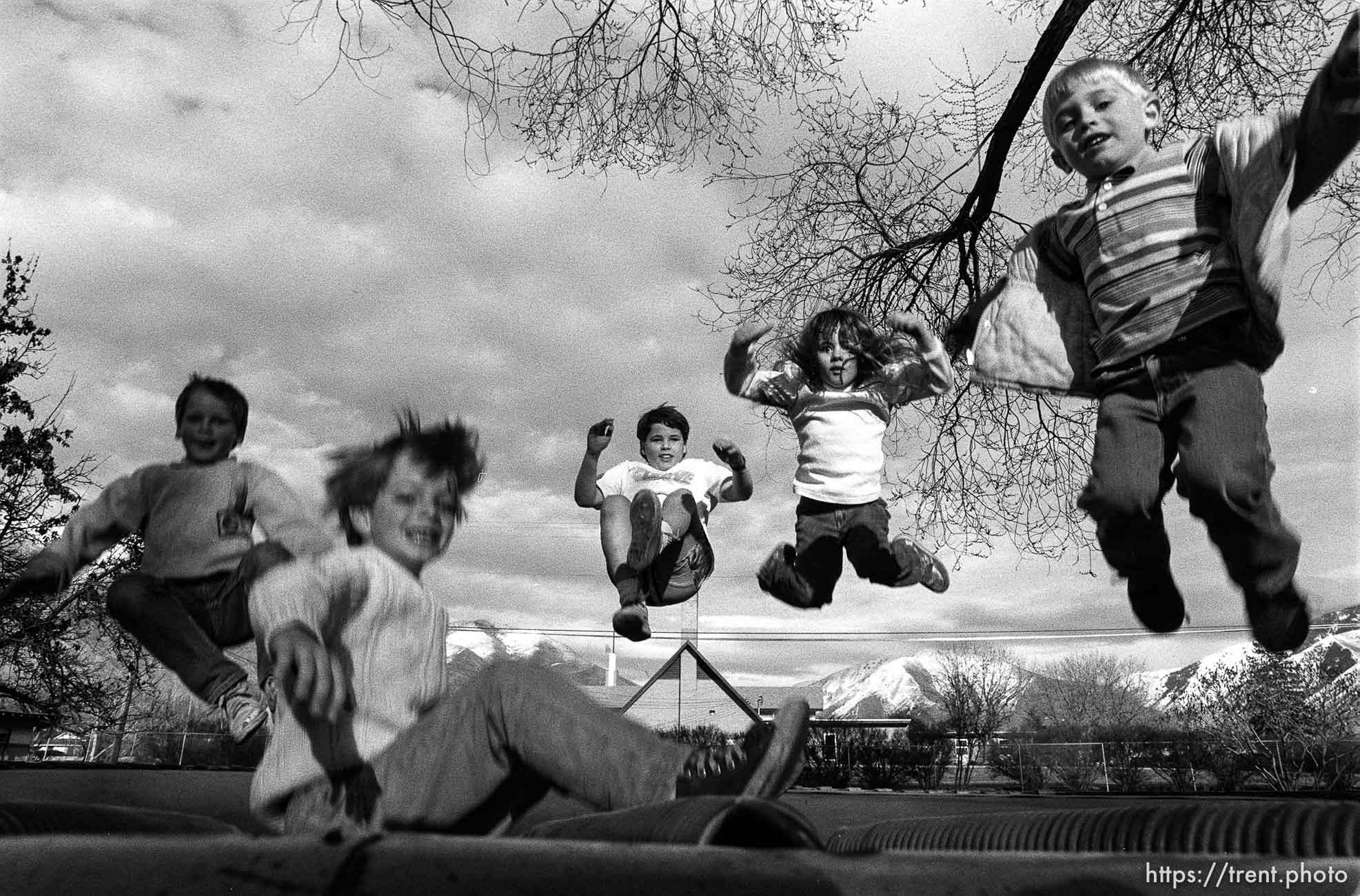 Kids on trampoline.