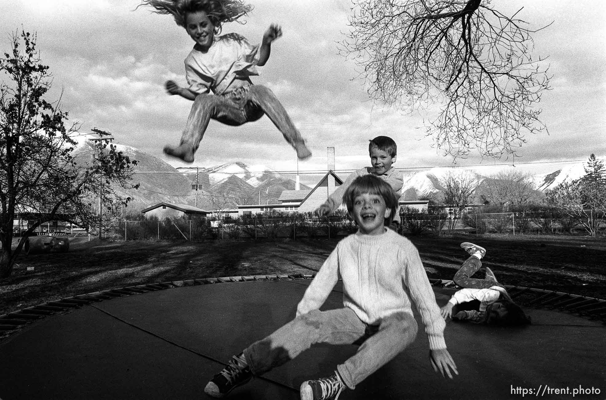 Kids on trampoline.