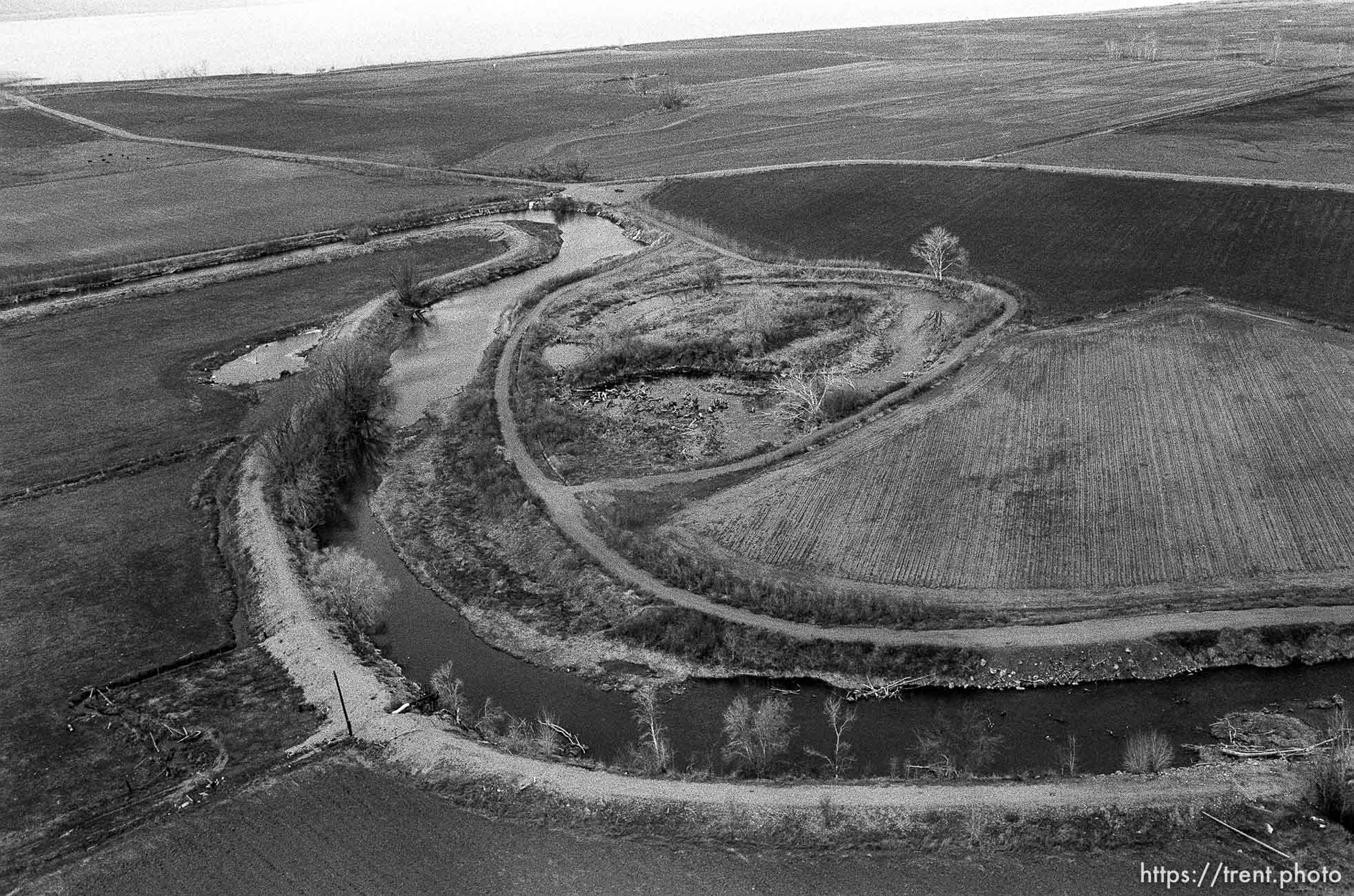 Aerial view of Provo River and dirt road.