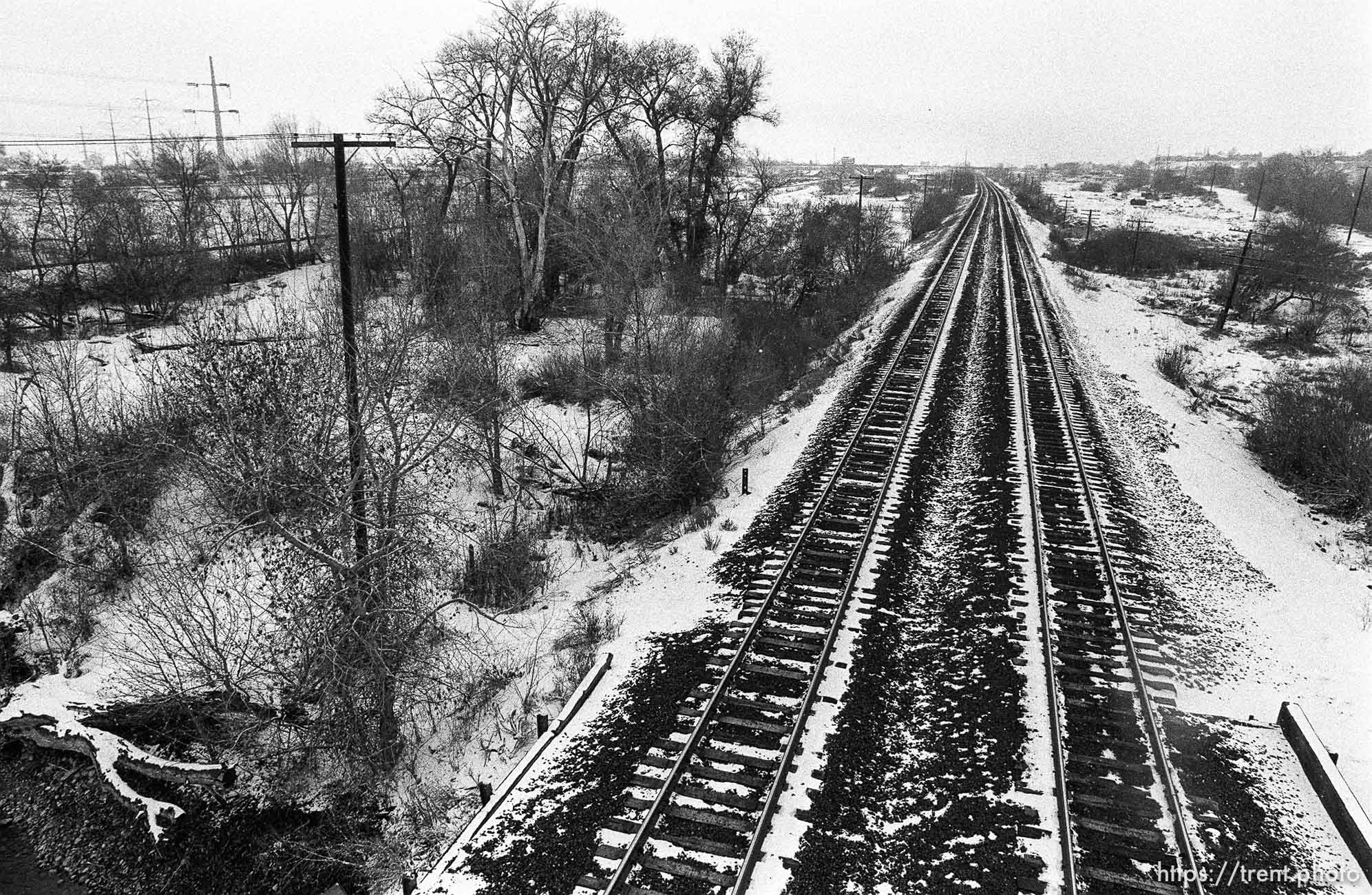 Railroad tracks from the Train Bridge, in winter with snow.