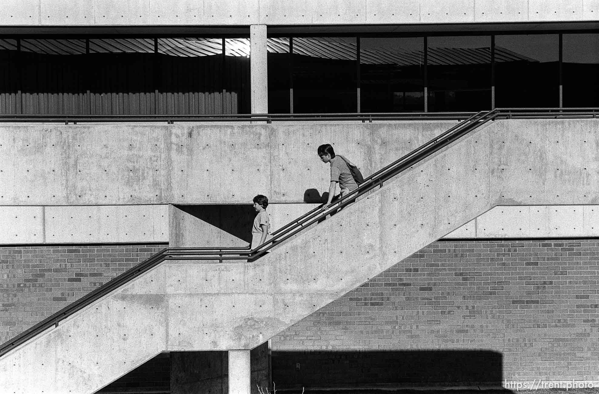 People walking down stairs at Utah Valley Community College.