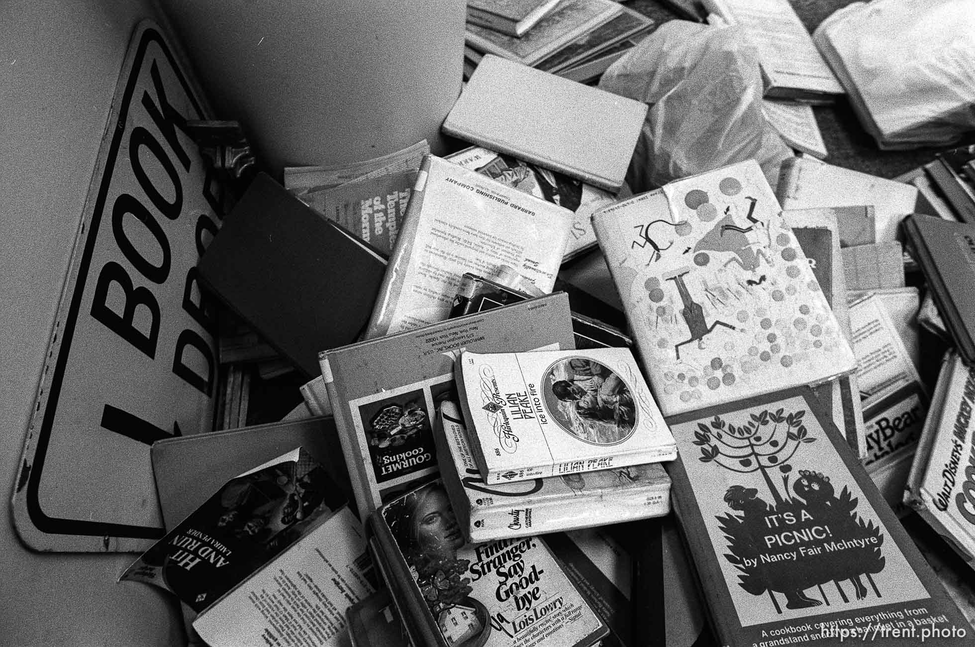 Returned books in the book drop for a story on the Provo Library being overcrowded.