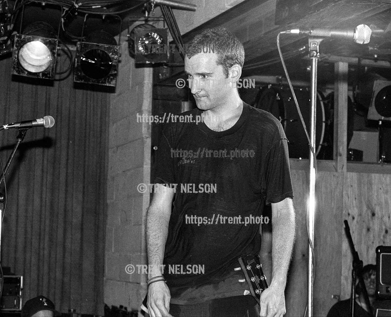 Ian MacKaye after racist skinhead charged the stage during Fugazi show at the Speedway Cafe.