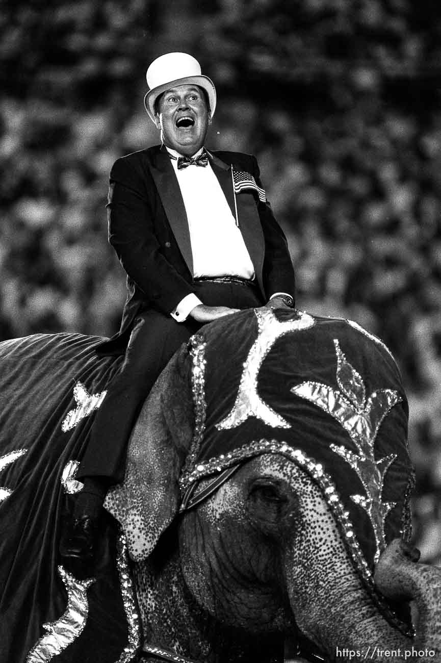 Willard Scott rides an elephant