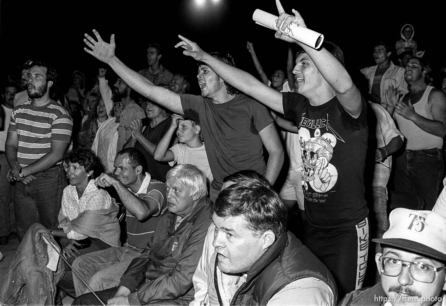 Crowd at professional wrestling match.