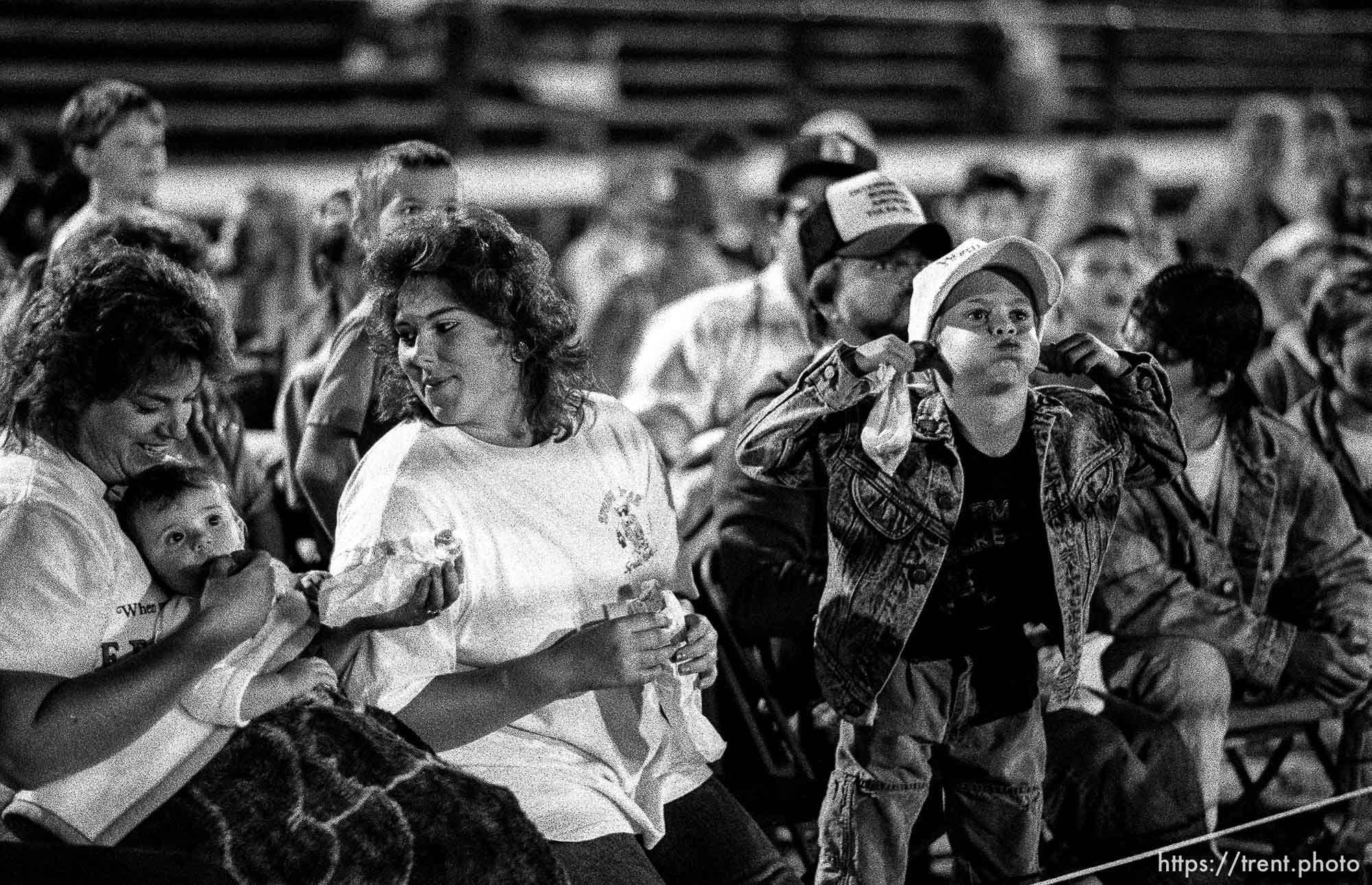 Crowd at professional wrestling match.