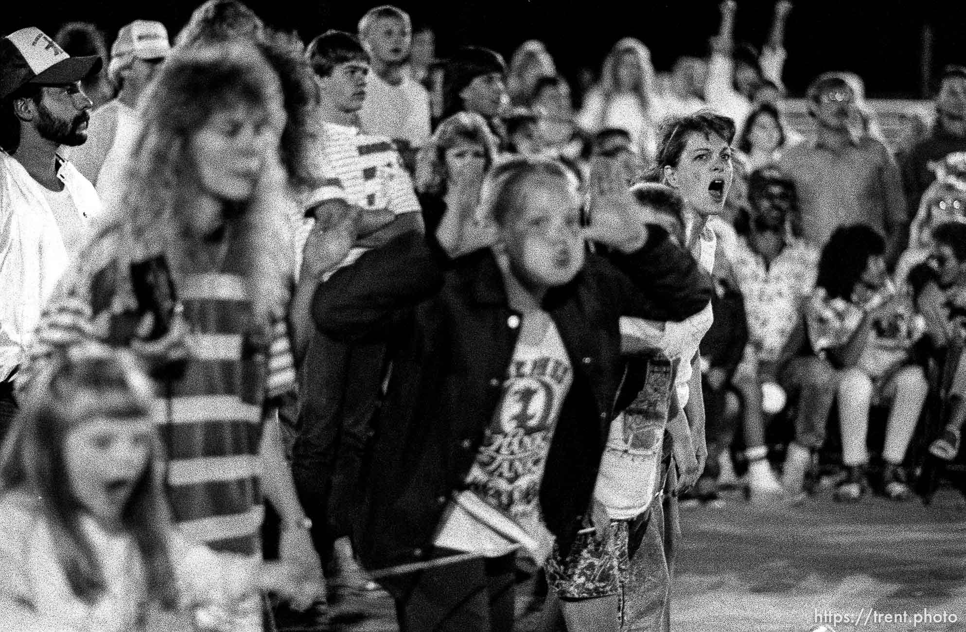 Crowd at professional wrestling match.