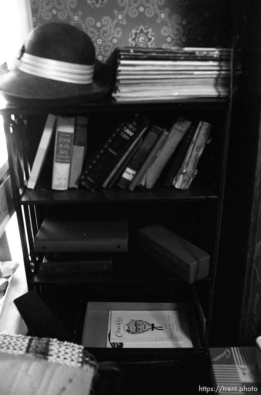 Bookcase and Kentucky Fried Chicken's Colonel Sanders at Nana's house.