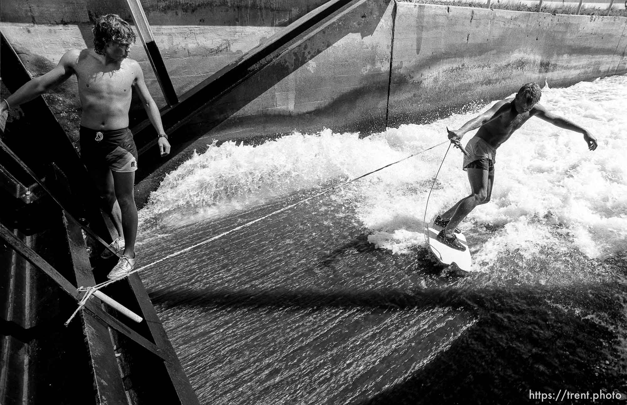 Kids surfing at diversion dam.