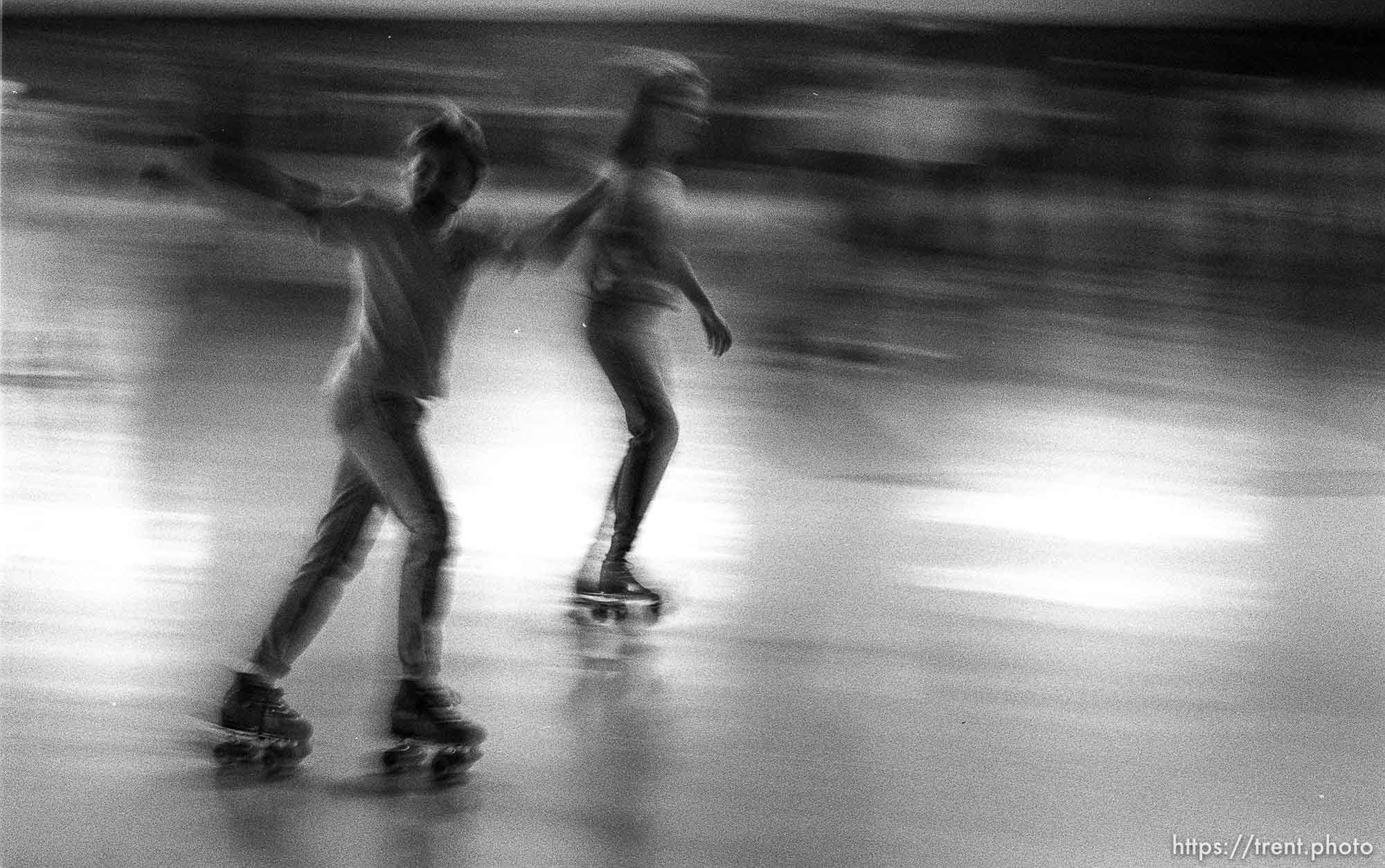 People skating at Classic Rollerskating rink.