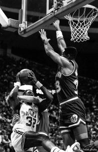 Karl Malone gets a hard foul at Jazz vs. Dallas basketball.