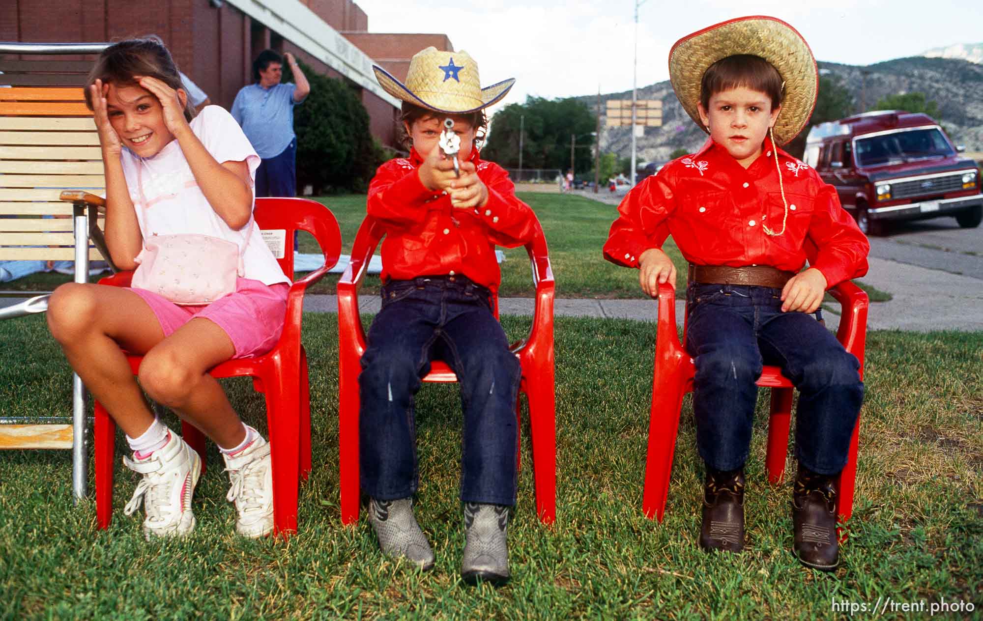 Cowboy kids with cap guns.