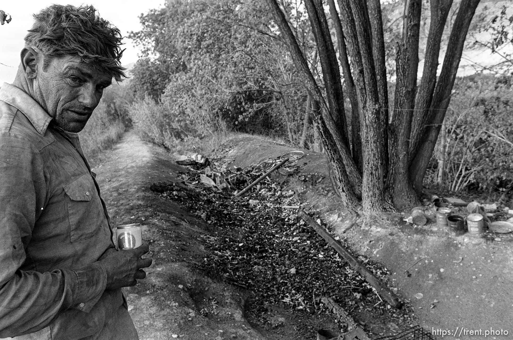 Casey at his camp, which was burned up in a fire while he was away.