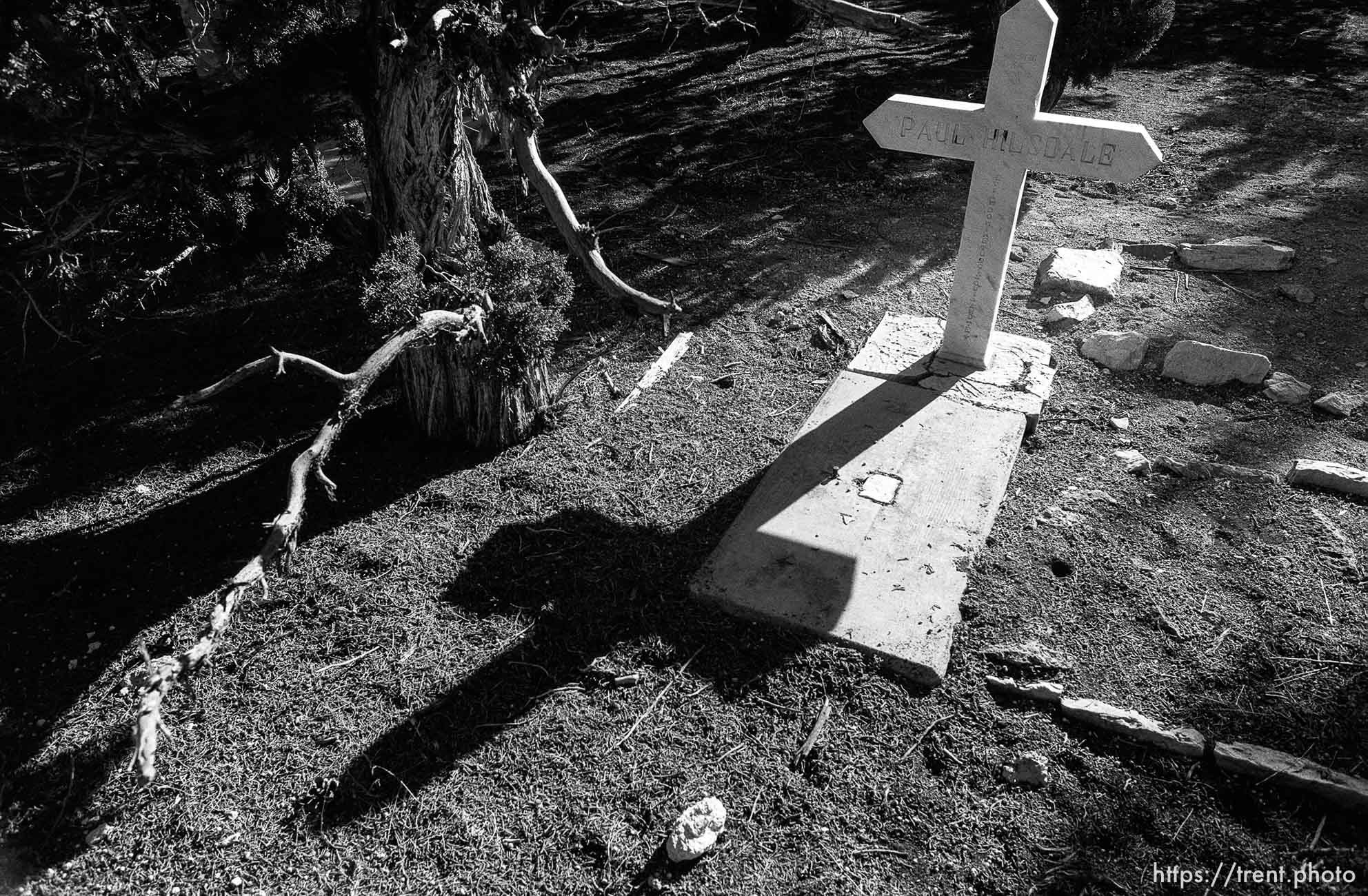 White cross grave at secret graveyard.