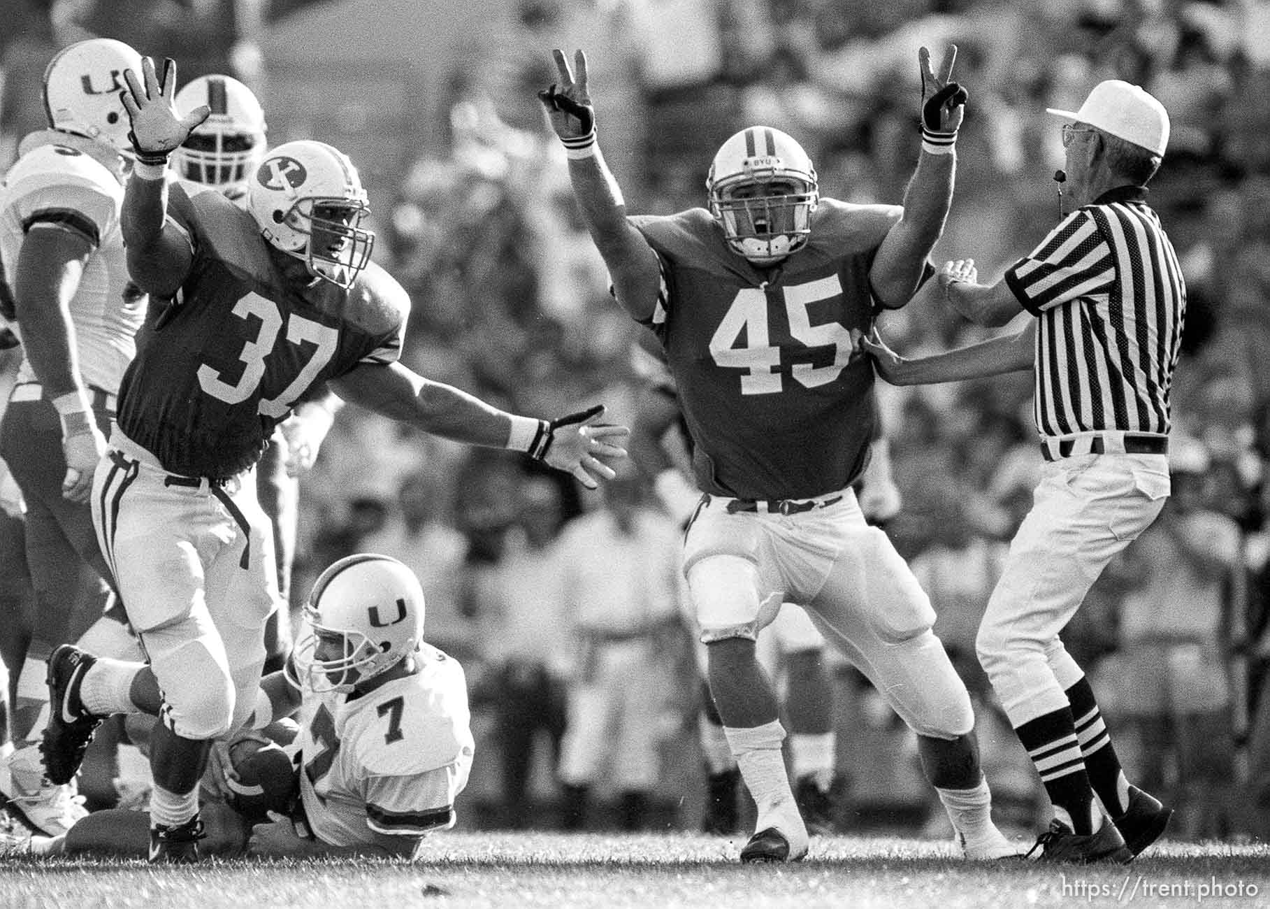 BYU players celebrate sacking Miami QB at BYU vs. Miami football.