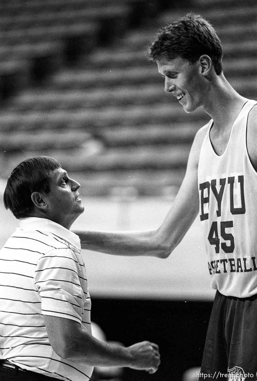 Coach Roger Reid and Shawn Bradley at BYU basketball practice.