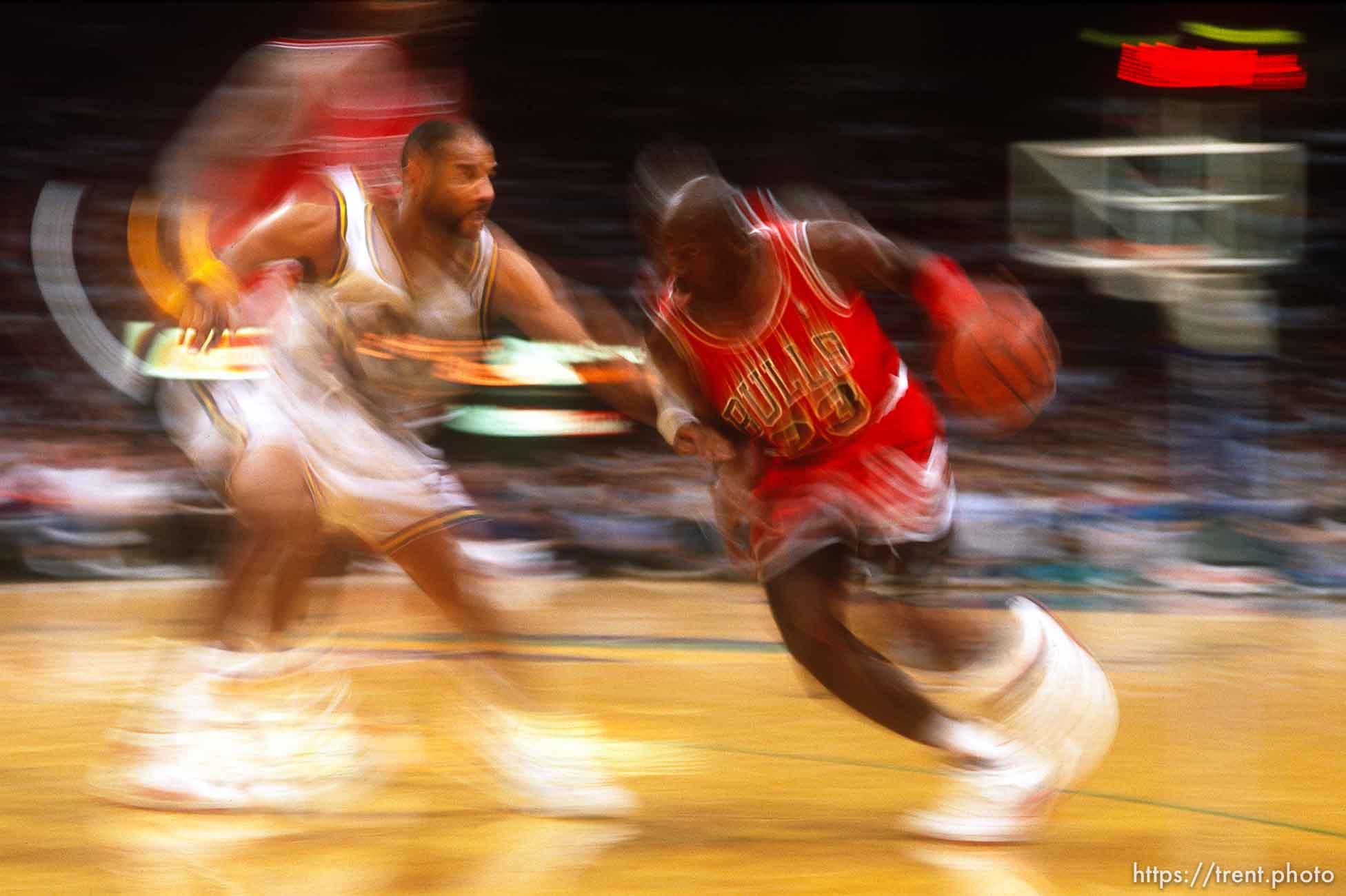 Michael Jordan drives at Utah Jazz vs. Chicago Bulls. slow shutter