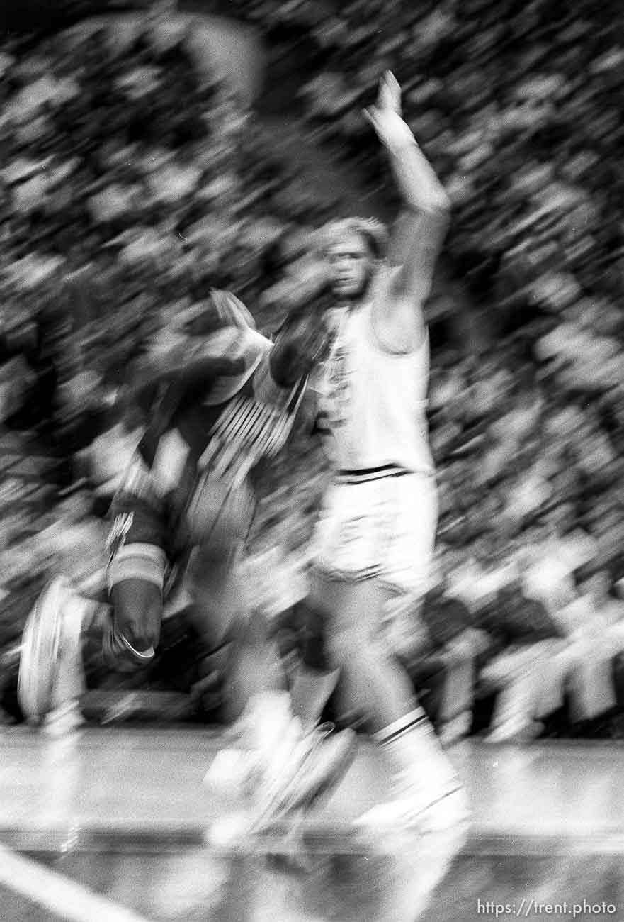 Hakeem Olajuwon runs into Mark Eaton at Jazz vs Houston (slow shutter).