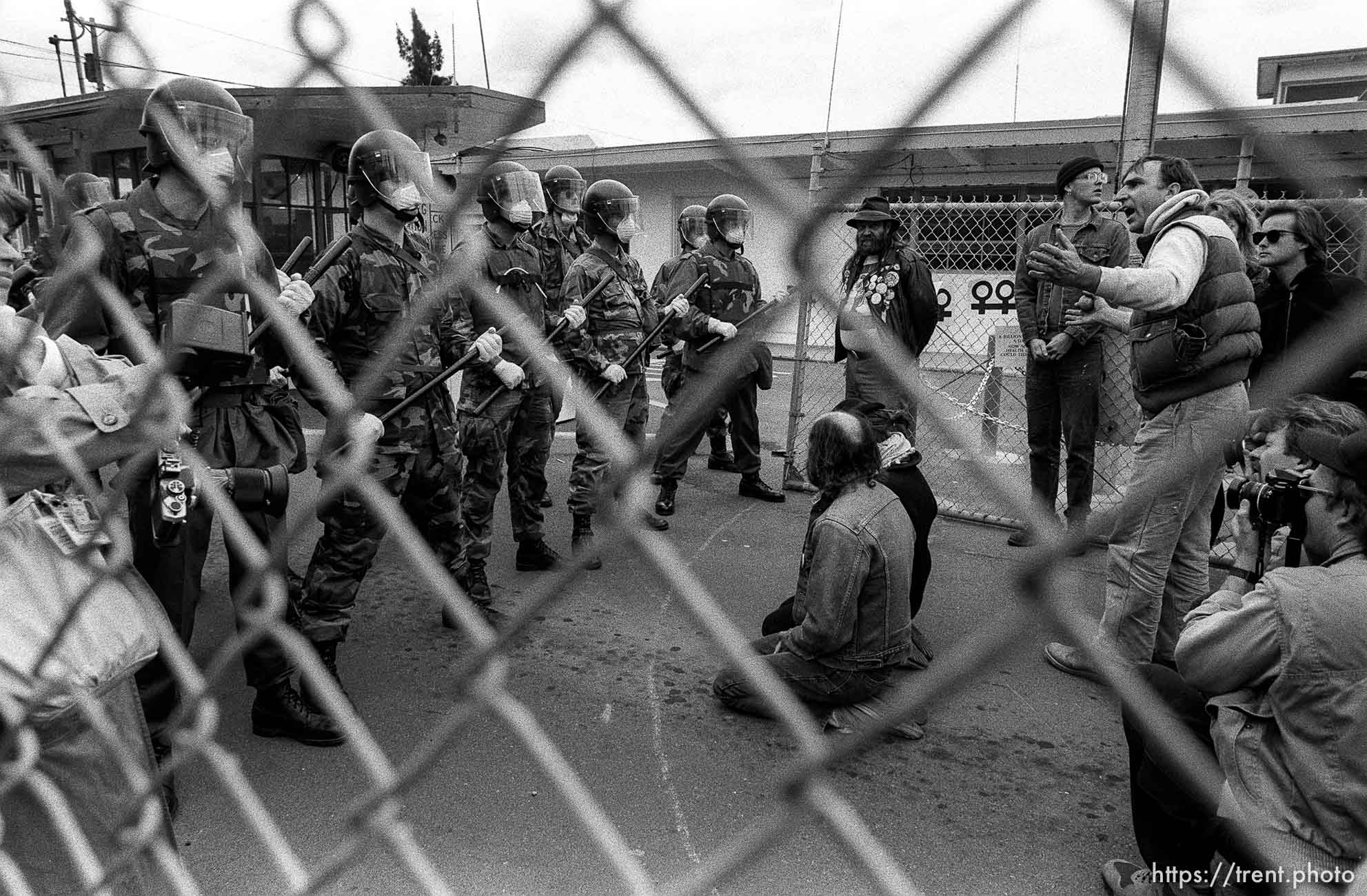 Soldiers and protesters stand off at the front gate at Gulf War protest at the Concord Naval Weapons Station.