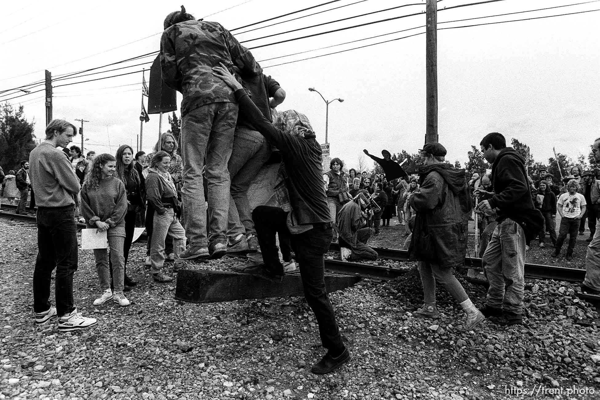 War protesters rip up train tracks at the Naval Weapons Station at Gulf War protest