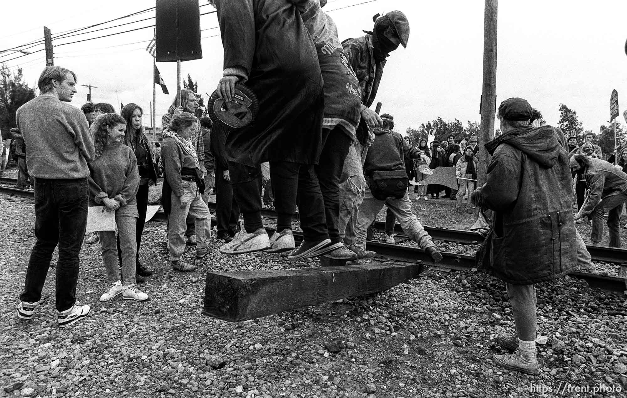 War protesters rip up train tracks at the Naval Weapons Station at Gulf War protest