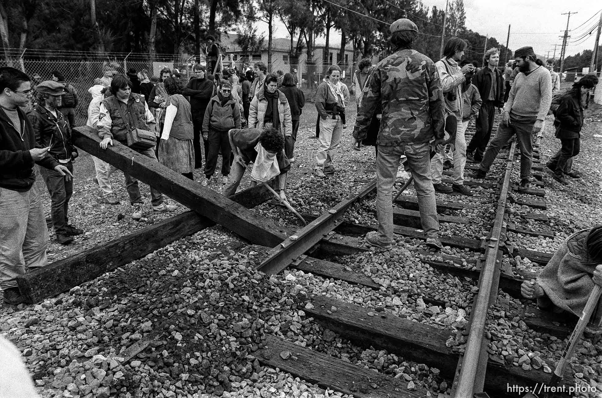 War protesters rip up train tracks at the Naval Weapons Station at Gulf War protest