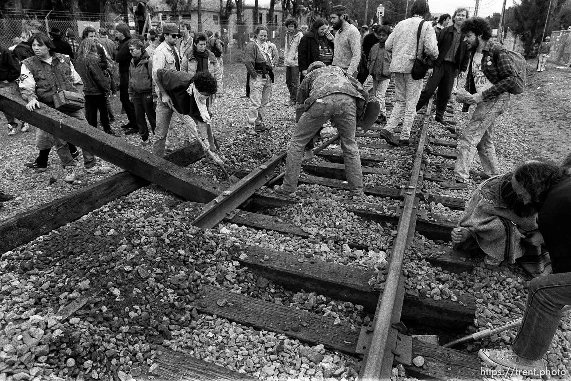 War protesters rip up train tracks at the Naval Weapons Station at Gulf War protest