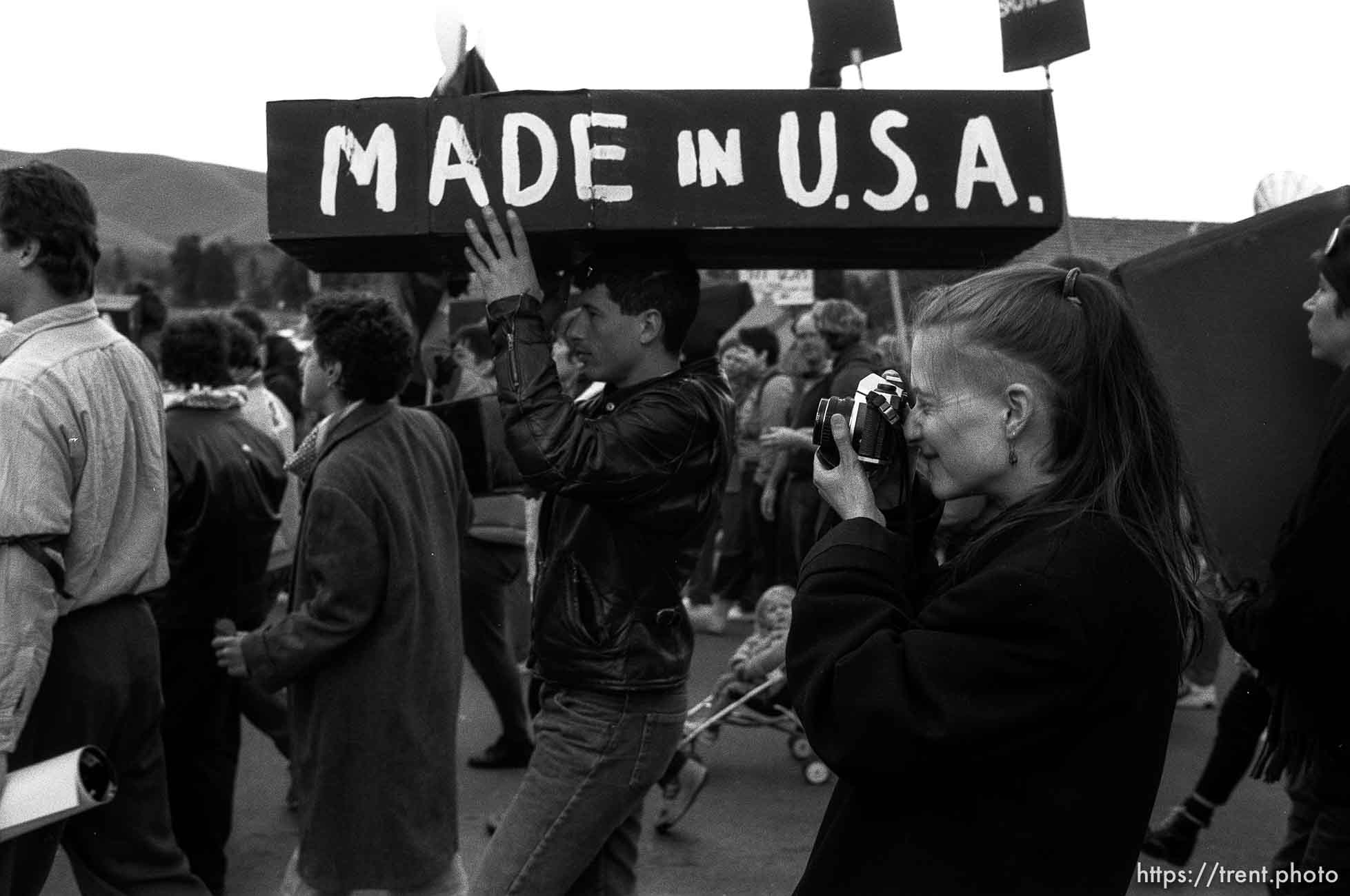 Photographer and coffin at the Naval Weapons Station at Gulf War protest