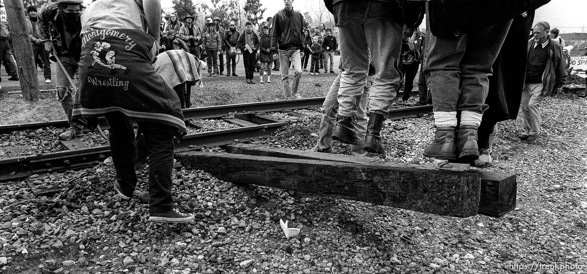 Protesters rip out train tracks at Naval Weapons Station at Gulf War protest.