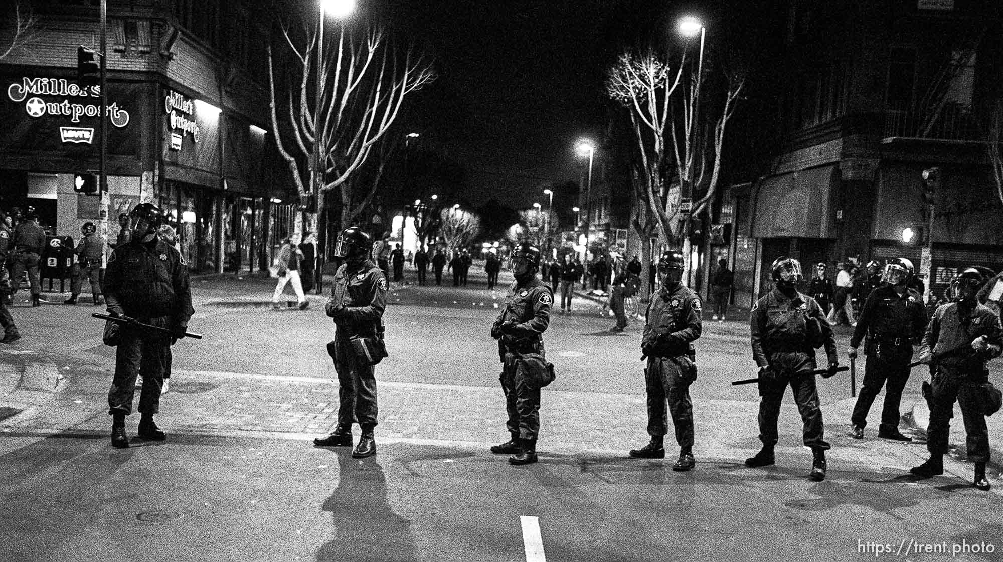 Riot police line up on Telegraph Avenue