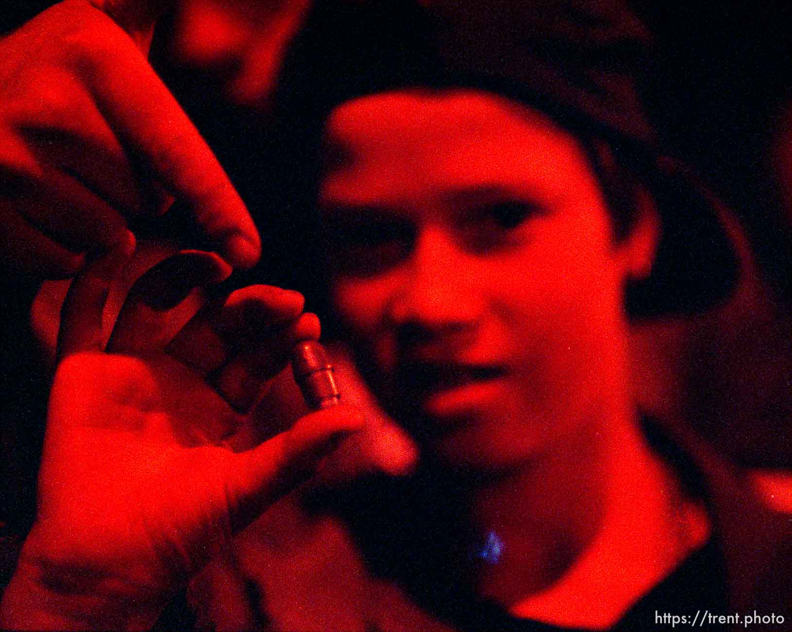 Kid holding rubber bullet used by police during riot and protests.