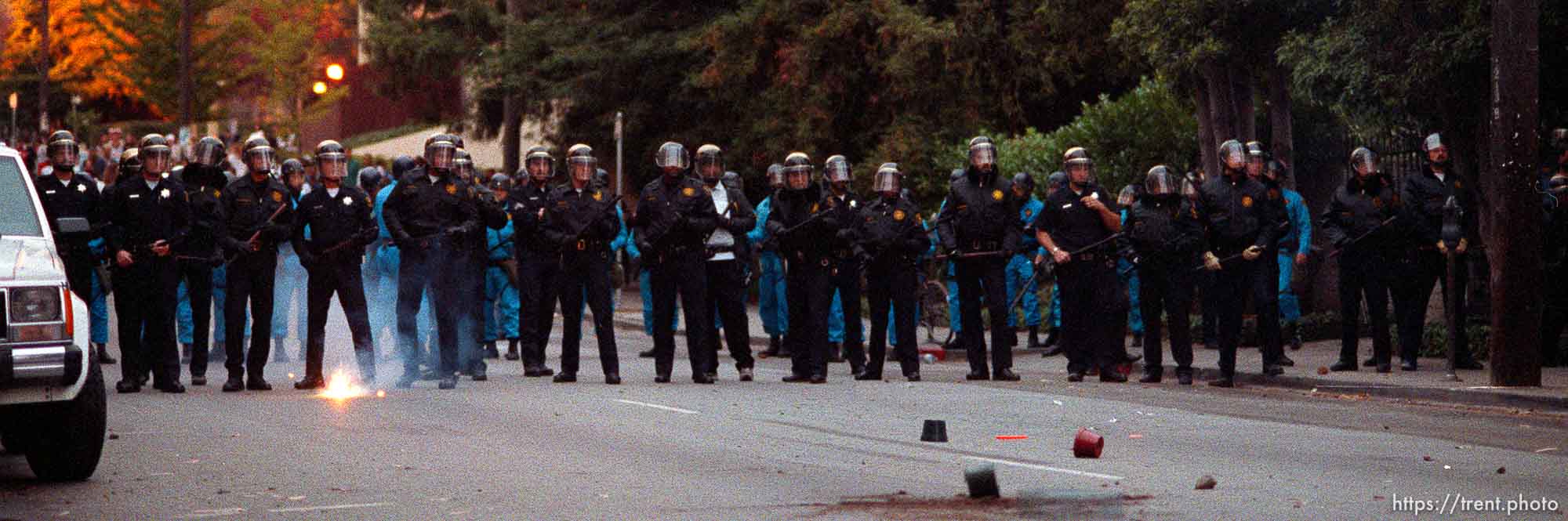 Police line is pelted with rocks during riots and protests.