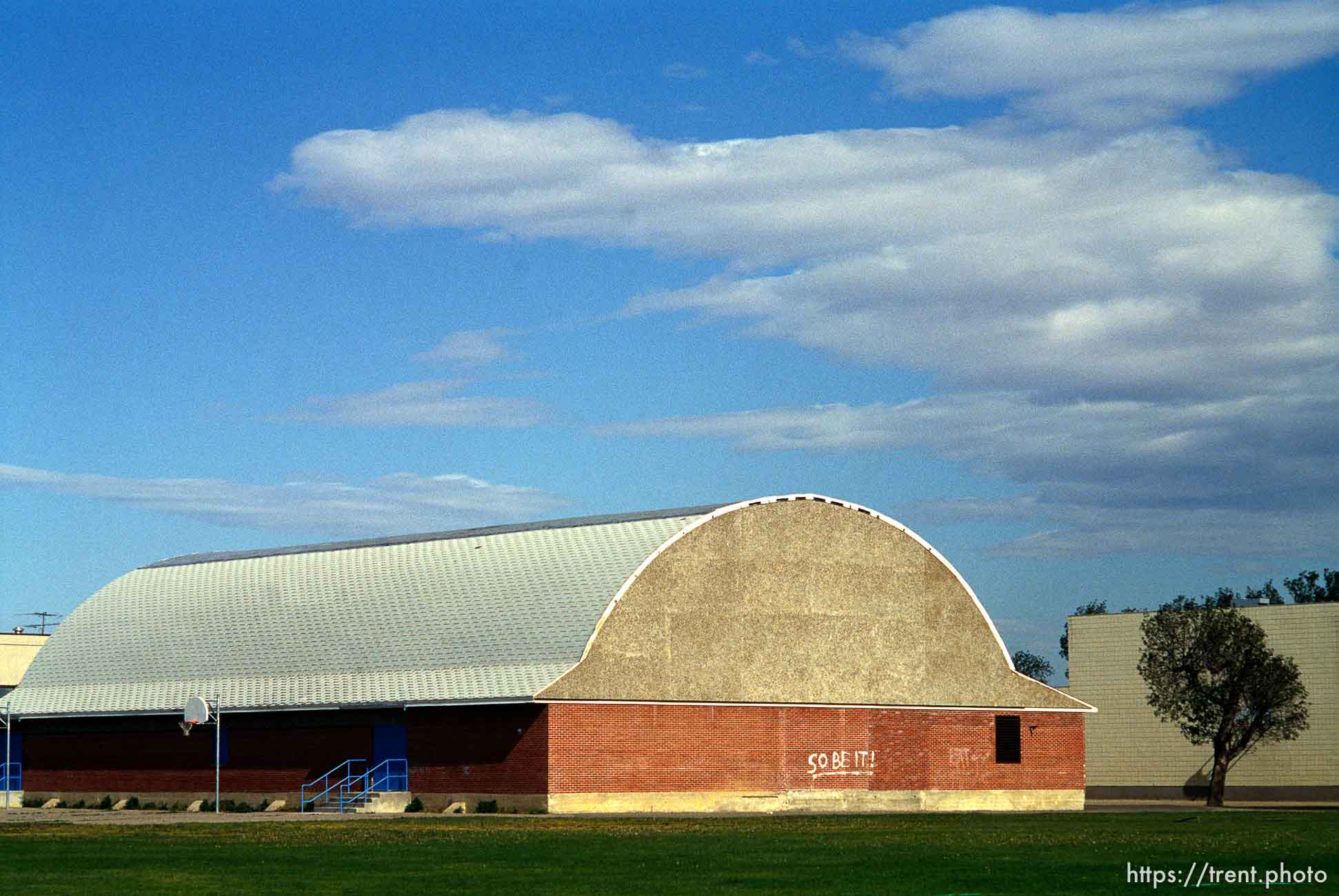 Magrath High School's auditorium with graffiti.