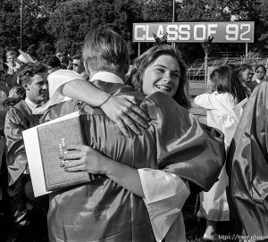 Graduates embrace at Acalanes High School graduation